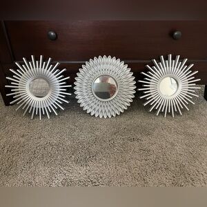 Plastic silver accent mirrors.  Really cute to add pop on wall.